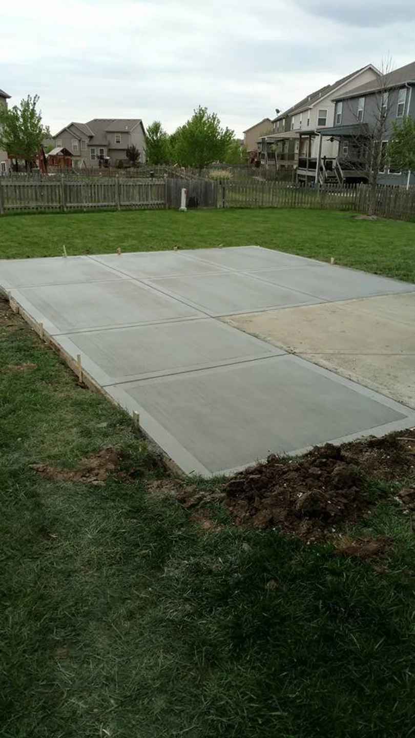 Residential concrete backyard slab installation in Kansas City